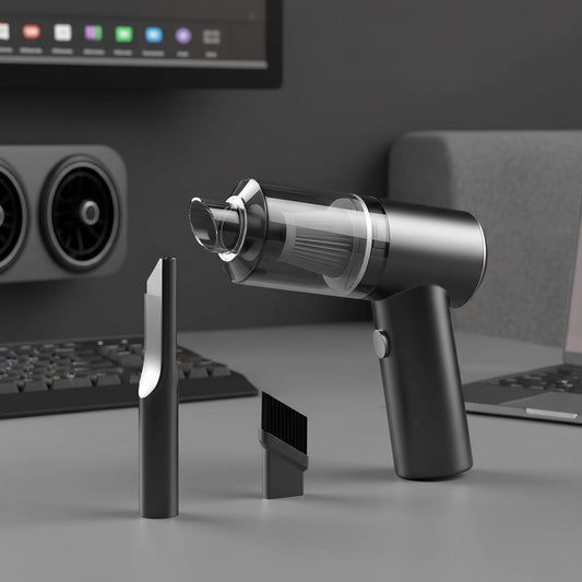 Black and silver handheld vacuum cleaner with attachments on a light gray background